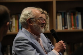 Audience Member Asking a Question