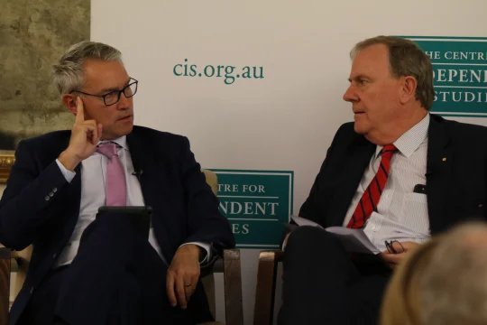 Tom Switzer and Peter Costello Speaking on stage