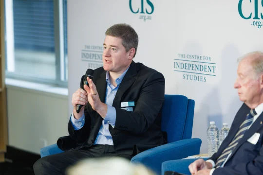 Simon Cowan speaking on stage at CIS event ''Is Australia’s Financial System Ready for the 21st Century?''