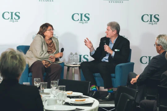 Kerrynne Liddle & Simon Cowan speaking on stage