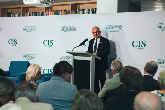Peter Kurti speaking on stage at CIS event ''The Darkest Path: The Puzzling Resilience of Antisemitism''