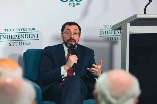 Rabbi Benjamin Elton talking on stage at CIS event ''The Darkest Path: The Puzzling Resilience of Antisemitism''