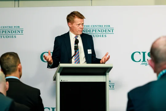 Sam Roggeveen speaking on stage