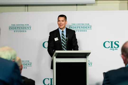 Doug Abdiel speaking on stage