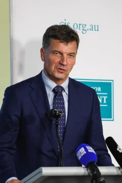 Angus Taylor speaking on stage